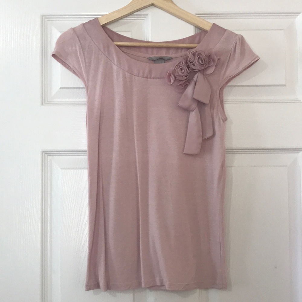 Pink blouse with flower and bow details